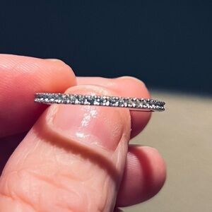 Moissanite and platinum eternity band